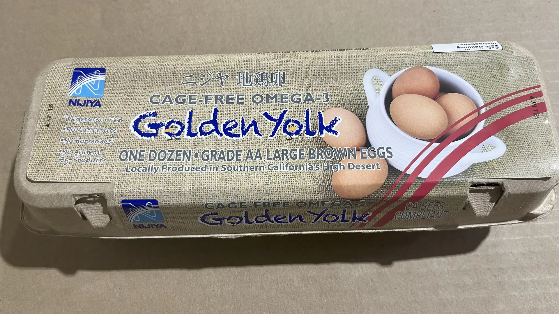 Nijiya Golden Yolk brown egg carton from the Country Eggs recall, photographed by FDA